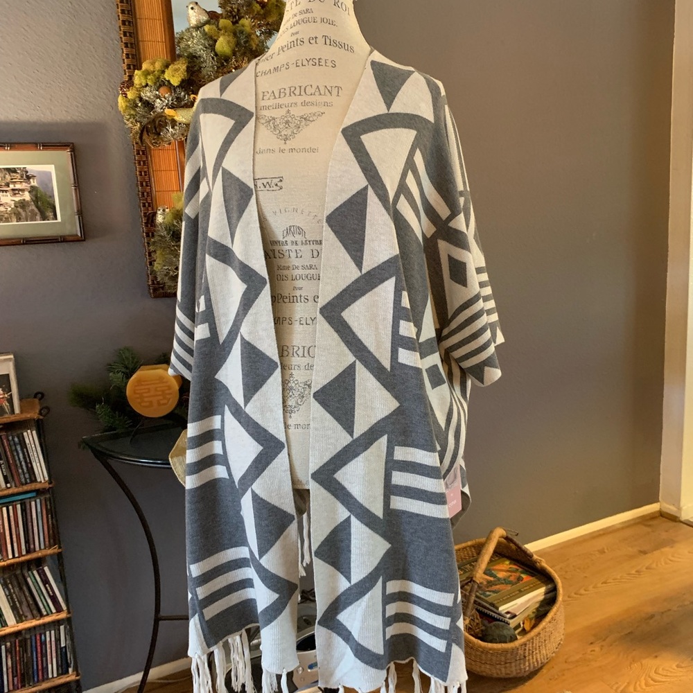 Beautiful Devotion by Cyrus Sweater Wrap. Bold Stylish Print, Fringe Detail.
